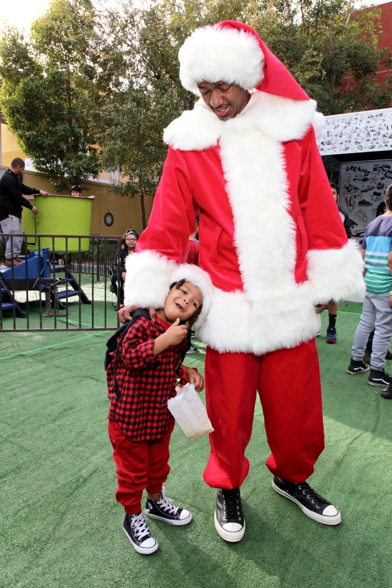 From family photos in matching pajamas to visits to see Santa, Nick is working overtime