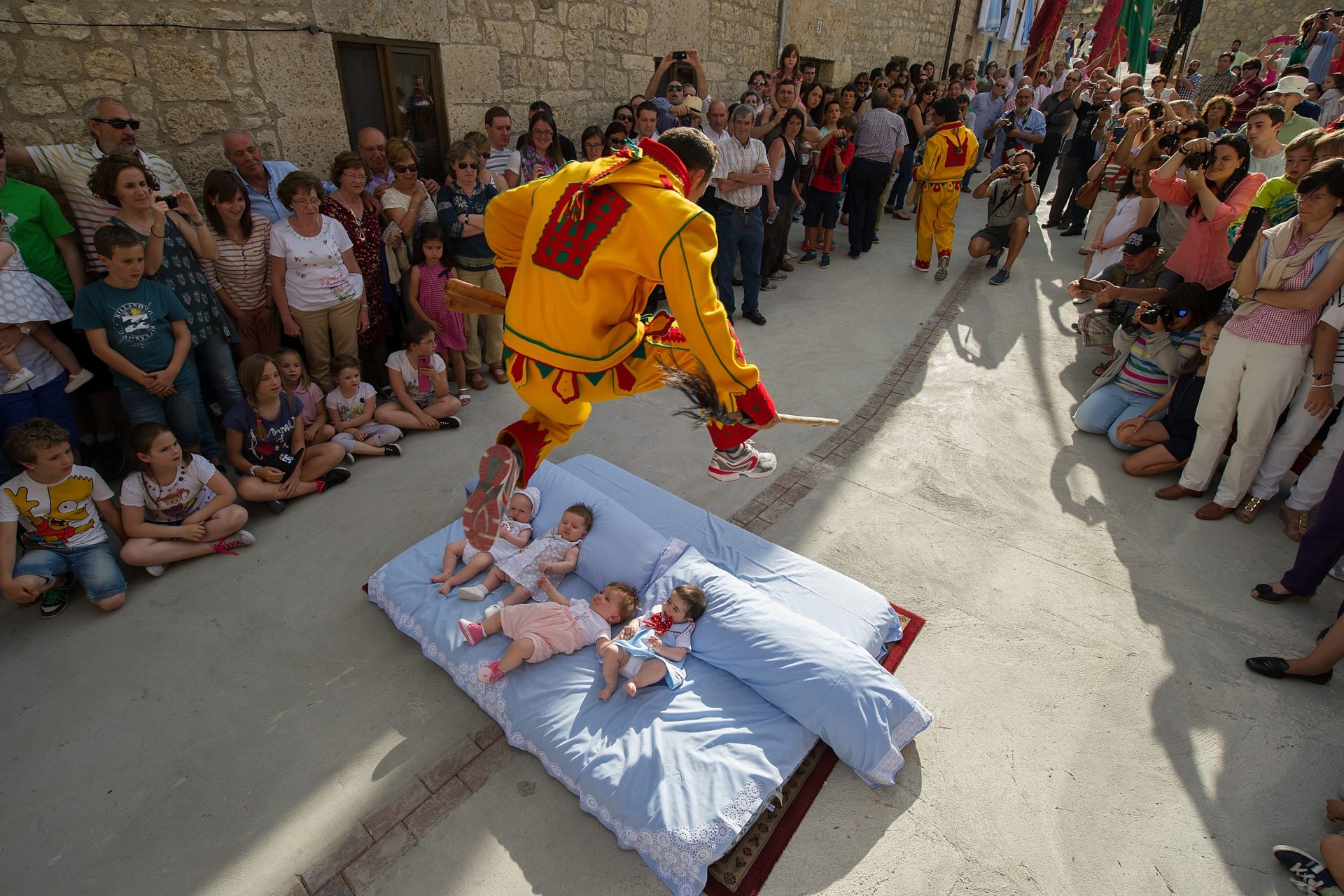 Inside the Spanish festival where a devil jumps over newborns in the street