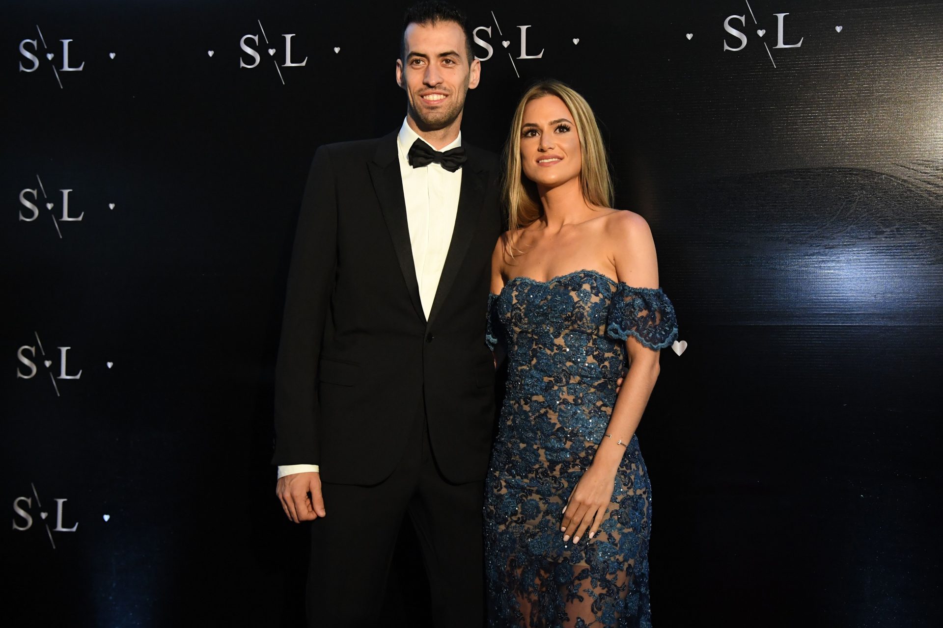 Sergio Busquets y Elena Galera